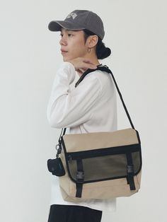 Editor's notesIt is a casual and trendy messenger bag. The bag is spacious and has buckle closure and a zip mesh pocket.- Messenger bag- Zipped mesh pocket- Spacious- Buckle closureMeasurements(in.)One Size- Width: 12.2 in.- Height: 10.6 in.- Depth: 4.3 in.*Model info: Height 5’ 11” Waist 32 in. / Fitting size: One SizeComposition & Care- 100% Polyester- Hand wash in cold waterDesigner- by ANALOGMOOD Casual Bags With Mesh Pockets For Daily Use, Casual Daily Use Bags With Mesh Pockets, Casual Mesh Bag For Everyday Use, Rectangular Bags With Mesh Pockets For Everyday Use, Functional Flap Satchel For Daily Use, Casual Mesh Bag For Daily Use, Casual Travel Bags With Mesh Pockets, Functional Everyday Bags With Mesh Pockets, Functional Everyday Bag With Mesh Pockets