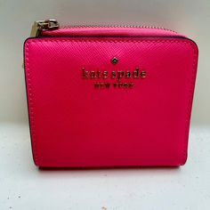 Type: Kate Spade Wallet Style: Fashionable Color: Pink Bag Size: Small Material: Leather All Sales Final! New With Tags Pink Rfid Blocking Wallet, Kate Spade Compact Wallet For Everyday, Kate Spade Compact Everyday Wallet, Kate Spade Everyday Bifold Bag, Pink Bifold Bag With Zipper Closure, Kate Spade Leather Wallets As Gift, Compact Kate Spade Wallet, Chic Kate Spade Rectangular Wallet, Trendy Kate Spade Wallets For Travel