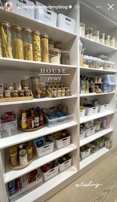 the shelves are filled with many different types of food in jars and containers on them