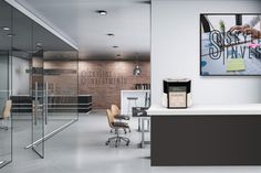 an office with glass partitions and chairs, coffee maker on the counter in front of it