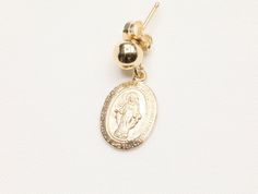 14k Gold Filled Virgin Mary Earrings / Miraculous Earrings / Catholic Jewelry / Gold Coin Jewelry / Catholic Gifts - 9 x 13mm Gold Filled Virgin Mary Pendant - Front design: Mama Mary - Back design: letter M with a cross on top and scattered stars - 14k Gold Filled 5mm stud - Sold as a pair - Tarnish free, hypoallergenic, nickel free and safe for sensitive skin 💰 We guaranteed fair pricing on all our jewelry. 🍃 All our jewelry comes with a modern style packaging, which includes a classy suede Gold Drop Earrings With Charms, 14k Gold Filled Charms Drop Earrings, 14k Gold Filled Drop Earrings With Charms, Yellow Gold 14k Charm Earrings, 14k Yellow Gold Earrings With Charms, Yellow Gold Charm Earrings For Gift, Anniversary Charms Earrings Round Shape, Yellow Gold Charm Drop Earrings, Charm Drop Earrings For Gifts