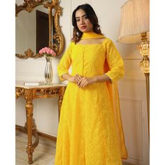 Yellow colored anarkali suit is prettified with chikankari work as shown which makes it appear classy. This top is made of georgette fabric which is accompanied with crepe bottom, inner and georgette dupatta. Women can buy this suit to wear for their parties and functions. Note:- The actual product may differ slightly in color and design from the one illustrated in the images when compared with computer or mobile screen. Size Chart Size: Semi Stitched/Unstitched can be altered from maximum to mi Elegant Yellow Churidar With Sheer Dupatta, Yellow Floor-length Churidar With Chikankari Embroidery, Yellow Floor-length Chikankari Churidar, Elegant Yellow Churidar With Chikankari Embroidery, Yellow Georgette Anarkali Set With Dabka, Elegant Yellow Anarkali Set With Dabka, Anarkali Style Floor-length Unstitched Suit With Chikankari Embroidery, Anarkali Style Unstitched Chikankari Embroidery Suit, Semi-stitched Salwar Kameez With Lace Work