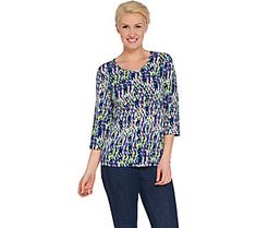 Check the fine print. This Liquid Knit top adds an effortless air of elegance to any ensemble. Featuring an allover pattern and 3/4-length sleeves, this posh topper is a flattering finishing touch. From Susan Graver. Spring Graphic Print Top With 3/4 Sleeves, Stretch V-neck Tops With Graphic Print, Jacquard Knit Relaxed Fit Long Sleeve Top, V-neck Patterned Top With Abstract Print, Poncho Blouse, Patterned Abstract Print V-neck Top, Susan Graver, Layered Blouse, Scoop Neck Tank Top