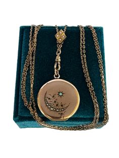 Stunning antique circa 1880's Celestial Motif Locket that hangs from a 1910s Edwardian era gold filled lorgnette chain! This gold filled cable style chain has a doubled chain style, and has a unique shaped charm that slides freely along the chain. The charm has a delicate engraved design with one genuine  seed pearls. A fantastic and versatile piece of Victorian & Edwardian era jewelry! ERA - Circa 1880s-1910's  METAL / MATERIAL - Gold filled chain, genuine opal, seed pearls  MARKINGS / HISTORY - The swivel clip is marked "RFG & CO", Locket marked D & C CONDITION - Good antique condition. Gold filled metal has been polished and cleaned. Age appropriate patina & wear remains. All stones are intact and secure. Amazing antique lorgnette chain and locket!  SIZE / MEASUREMENTS - Locket: 1 5/8 x Victorian Medallion Jewelry For Vintage Events, Antique Round Jewelry For Vintage Collection, Antique Medallion Necklace For Vintage Events, Victorian Round Necklace With Antique Finish, Victorian Locket Necklaces For Vintage Events, Antique Round Necklaces For Vintage Events, Victorian Round Necklace With Intricate Design, Victorian Necklace With Intricate Design, Victorian Necklaces With Intricate Design