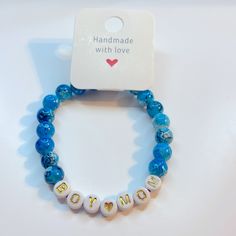 Handmade Boy Mom Stretch Bracelet. Boy Mom Bracelet, Personalized Blue Bracelets For Everyday Wear, Casual Blue Everyday Bracelets, Personalized Blue Bracelets, Light Blue Casual Bracelet Gift, Casual Blue Stretch Bracelet For Everyday, Personalized Blue Bracelet For Mother's Day, Casual Light Blue Adjustable Beaded Bracelets, Casual Stretch Bracelet With Round Beads For Mother's Day