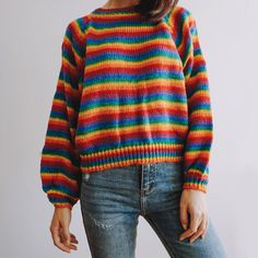 A true rainbow stripe knit sweater with a high neckline and slightly cropped fit. One size fits S-M 44" chest 16.5" length Trendy Rainbow Sweater For Fall, Casual Rainbow Knitted Sweater, Rainbow Crew Neck Sweater For Fall, Trendy Rainbow Knit Sweater, Multicolor Knit Cropped Sweater With Crew Neck, Cherry Sweater, Stripe Knit Sweater, Mock Neck Shirt, Cropped Knit Sweater