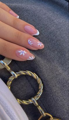 White tip french nails on oval nails with lilac daisy’s design on two fingers .
Gold belt, grey skirt, white top Gel Nails For Summer, Graduation Nails Ideas, Nail Art Gel Nails, Lilac Nails Design, Art Gel Nails, Gel Nails Nail Art, Oval Nails Designs, Nails For Summer, Lilac Nails