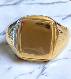 Antique 10k Yellow Gold SQUARE Face SIGNET Ring ENGRAVABLE Size 9 Really beautiful and very unique antique 10k yellow gold Signet ring! * Freshly polished up beautifully by my jeweler it's ready for you to wear! * Size 9 * Weighs 3.9 grams  Please message me with any questions!  Shipped FAST AND FREE, fully insured and gift boxed :) I guarantee item to be exactly as described and pictured. Rectangular 14k Stamped Signet Ring Collectible, Vintage Gold Engraved Ring, Tarnish Resistant, Classic Rectangular Signet Ring Stamped 14k, Vintage Gold Engraved Ring Tarnish Resistant, Vintage Gold Engraved Tarnish-resistant Ring, Square Classic Signet Ring For Formal Occasions, Classic Square Signet Ring For Formal Occasions, Gold Signet Ring With Polished Finish For Collectors, Classic Square Rings With Polished Finish