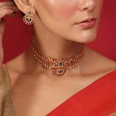 "A gorgeous necklace set which is a perfect mix of modern and tradition is hard to find & this Akshi Antique Choker set is one of them. Blended with a cultural touch with modern look makes it unique in its own way. Crafted with high quality CZ stones with beautiful craftsmanship at Tarinika workshop. [Style] Get this exquisite choker style designer Akshi Antique choker set by Tarinika to give yourself the perfect mix of traditional roots with a modern touch. [MATERIALS]: CZ stones with Antique P