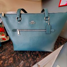 This Is An Absolutely Beautiful Bag! I Bought It, And It's Just Been Sitting In My Closet Now Never Been Used. Still Has The Tags And Padding. New With Tags. Store Price Was: $330 When I Bought It On-Sale. Great Bag With A Lot Of Room! Coach Tote, Dark Turquoise, Beautiful Bags, Womens Tote Bags, Coach Bags, Turquoise, Tags, Women Shopping, Closet