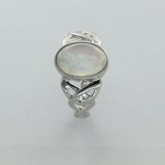 These is a beautiful pair of Sterling Silver Ring with a Rainbow Moonstone Gemstone. The ring are made out of solid 925 Silver and there is no nickel or other substances causing most allergies. This makes the ring hypo allergenic. Size of the Moonstone 1.2 x 0.8 cm or 0.47 x 0.31 inch You will receive the item in a gift box - perfect to surprise someone or yourself. Usually we ship on the same day we receive the payment for the order. We want you to be happy with your purchase. If you do not lik White Polished Moonstone Ring In Sterling Silver, Polished White Moonstone Ring In Sterling Silver, Sterling Silver Moonstone Ring With Polished Finish For Promise, White Moonstone Ring With Polished Sterling Silver, Spiritual Moonstone Ring In Sterling Silver For Anniversary, Spiritual Sterling Silver Moonstone Ring For Anniversary, Silver Sterling Moonstone Wedding Ring, Mystical White Sterling Silver Jewelry, Silver Sterling Crystal Ring With Round Stone