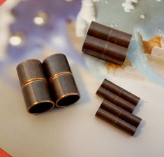 three pieces of chocolate sitting on top of a table