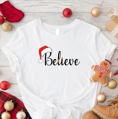 Believe Christmas Shirt, Christmas Party Shirt Christmas T-Shirt, Christmas Family Shirt, Believe Shirt, Holiday Gift,Christmas Matching Tee WELCOME TO "DandelionDesignUShop" ! High quality and super soft, comfortable shirt. Made with top of the line vinyl and pressed with a professional grade heat press. All our simple color ones like White, Black, and Red are 100% Cotton. All our Heathered Colors are cotton/polyester blend and they are super comfy soft!   SIZING AND COLORS Make sure you check Believe Christmas Shirts, White Christmas Festive T-shirt, White Relaxed Fit Christmas T-shirt, Christmas Short Sleeve T-shirt With Text Print, Gift Christmas, White Christmas T-shirt With Character Print, Christmas Party Shirts, Matching Tees, Family Christmas Shirts