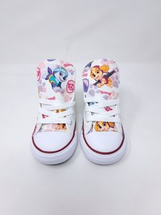 Order at www.Hallwayzdesigns.com use code ETSY10% to receive 10% off your order.  Not all options are available on Etsy. Please view our website for exclusive designs such as BLUEY, COCOMELON, AND MANY MORE!Personalized Skye Everest Paw Patrol Converse shoes Girl Infant Toddler custom Birthday sneaker by Hallwayz Designs Licensed fabric sewn directly onto authentic Converse sneaker. Please read full description.  Need it fast? Add rush order to guarantee 5-7 day PROCESSING. Domestic orders will Casual High-top Sneakers For Birthday, White High-top Sneakers For Birthday, Casual Lace-up Sneakers For Birthday, Cute Low-top Sneakers For Birthday, Customizable Cute Low-top Sneakers, Cute White High-top Custom Sneakers, Customizable Cute Lace-up Sneakers, Customizable Lace-up Cute Sneakers, Cute Customizable Lace-up Sneakers