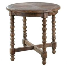 an old wooden table with turned legs and a round top, on a white background