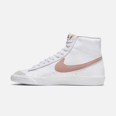 Style No. CZ1055-118 Color: White/Peach/Summit White/Pink Oxford Styled for the '70s. Loved in the '80s. Classic in the '90s. Ready for the future. The Nike Blazer Mid '77 delivers a timeless design that's easy to wear. Its unbelievably crisp leather upper gets broken in beautifully, and is paired with bold retro branding and luscious suede accents for a premium feel. Nike Blazer Mid '77 Women's Shoes Mid Blazer 77, Nike Mid Blazer, Nike Blazer Mid 77 Women, Nike Rosa, Nike Blazer Mid 77 White, Gym Girl Aesthetic, Mid Blazer, Nike Mid, Blazer Shoes