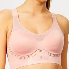 The Pink Sports Bra Comprises A Tight Fit With Cups And Adjustable Shoulder And Back Straps For Ultimate Support. Mesh Panels And A Perforated Under Bust Band Enhance Breathability. Completed With A Printed Logo Badge. Climacool Technology Quick-Dry Fabrics Fitted Pink Sports Bra With Medium Bust Support, Pink Sleeveless Sports Bra For Running, Pink Sleeveless Sports Bra With Medium Bust Support, Sleeveless Bra-friendly Pink Sports Bra, Pink Stretch Sports Bra With Light Support, Pink Workout Top With Medium Bust Support, Pink Workout Top With Bust Support, Pink Yoga Top With Medium Bust Support, Sporty Pink Tops With Medium Bust Support