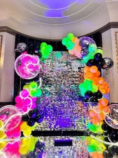 an overhead view of balloons and streamers on the floor