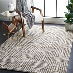 SAFAVIEH Tibetan TIB608Z Hand-knotted Black / Ivory Rug Image 1 Rug Size Guide, Wayfair Furniture, Kitchen Wallpaper, Wool Area Rug, Indoor Area Rugs, Grey Area Rug