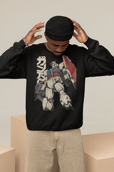 Unisex, Gundam Sweater, 90s Anime Shirt, Vintage Shirt, Robot Anime Lovers, Anime shirt, Japanese Manga Shirt, Retro Gundam Anime Sweatshirt Ideal for any situation, a unisex heavy blend crewneck sweatshirt is pure comfort. These garments are made from polyester and cotton. This combination helps designs come out looking fresh and beautiful. The collar is ribbed knit, so it retains its shape even after washing. There are no itchy side seams on these sweaters.  .: 50% cotton, 50% polyester .: Med Pop Culture Anime Print Crew Neck Shirt, Pop Culture Anime Print Crew Neck Tops, Harajuku Style Crew Neck Shirt For Streetwear, Retro Anime Print Tops For Streetwear, 90s Anime Print Crew Neck Top, Long Sleeve Anime Print Top For Fans, Anime Print Long Sleeve Top For Fans, Long Sleeve Top With Anime Print For Fans, Anime Print Crew Neck Shirt For Streetwear