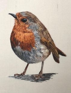 a drawing of a small bird sitting on top of a table