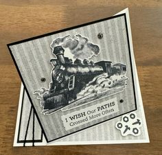 a card with an image of a train on the front and back side, which reads i wish out paths crossed more often