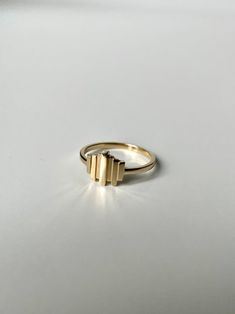 your new fave. a solid 14k gold art deco statement ring. fine jewelry. made in NYC.material: solid 14k yellow gold (hypoallergenic and will last forever)art deco detail is 10.17mm wide care: while solid 14k gold will last forever, it’s smart to gently wipe and clean it after wearing. use a soft cloth to remove lotions Gold Art Deco Ring, Bijoux Art Deco, Dope Jewelry Accessories, Evil Eye Ring, Jewelry Safe, Gold Art Deco, Deco Ring, Bling Rings, Gold Art