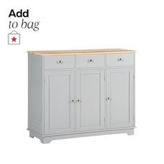 a white cabinet with two doors and three drawers on the bottom, next to a red star