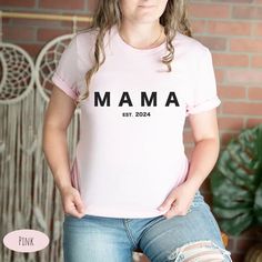 Show off your love and excitement for the upcoming arrival of your newest family member with our Mama est 2024 Tee. Crafted from high-quality materials, this comfy and stylish tee is the perfect pregnancy announcement. Click to buy now and start looking forward to the day your little one arrives.