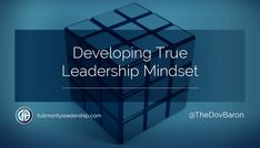 a blue cube with the words developing true leadership mindset