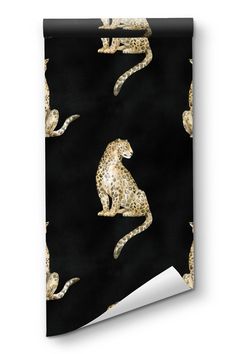 a black background with gold leopards on it