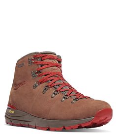 a brown hiking boot with red laces on the outstep and side zipper