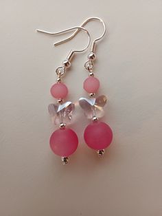 Pink butterfly dangle earrings Pink Butterfly Jewelry For Summer, Butterfly Charm Earrings For Party, Party Butterfly Earrings With Charm, Elegant Pink Butterfly Charm Earrings, Party Butterfly Charm Earrings, Elegant Pink Earrings With Butterfly Charm, Pink Butterfly Charm Earrings, Pink Butterfly Charm Drop Earrings, Pink Butterfly Earrings For Summer