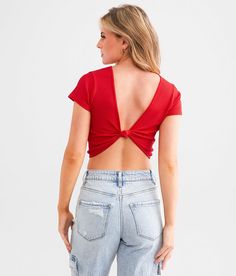 Freshwear Ribbed Stretch Top - Red XS/S, Women's Tomatopuree Twisted back cropped top Bust measures 27 on size XS/S Body length 15 on size XS/S Can be styled multiple ways. 92% Nylon 8% Spandex. Machine wash cold water with like colors. Gentle cycle. Reshape lay flat to dry. Do not bleach. Low iron if needed.. Measurements: Bust -Fullest part of bust with arms at sides. Waist -Circumference of natural waist: above belly button below rib cage. Hips -Standing with feet together fullest part of hip Chic Red Crop Top, Trendy Red Cropped Top, Stretch Top, Waist Circumference, Top For Women, Women Shirts Blouse, Rib Cage, Low Iron, Shirts Blouses