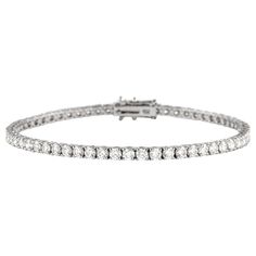 Exquisite and timeless diamonds tennis bracelet, by Alexander Beverly Hills. 63 round brilliant diamonds, 4.35 carats. Approximately F/G color and VS clarity. Four prong set in 18k white gold, 10.42 grams, 7 inches. Accommodated with an up to date digital appraisal by a GIA G.G., once purchased, upon request. Please contact us with any questions. Thank you. Item Number MS1758NP Bracelet Tennis, Diamond Tennis Bracelet, Tennis Bracelet Diamond, Brilliant Diamond, Tennis Bracelet, Round Brilliant, Beverly Hills, Prong Setting, Alexander