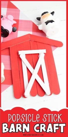 popsicle stick barn craft with farm animals on the side and text overlay that says popsicle stick barn craft