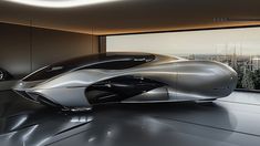 a futuristic car is parked in front of a window