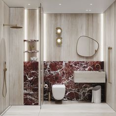 a modern bathroom with marble walls and flooring, along with a white toilet in the corner