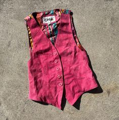 Vintage real leather vest Buttery soft hot pink suede fits estimated xs/s Estimated age 1980s Can be worn layered or as a sleeveless top Excellent vintage condition; normal light wear and distressing. Clean and odor free Approximate measurements 11" shoulder to shoulder 16.5" pit to pit 21.5" length All items are sold as is with no returns and no partial refunds. I describe and measure items carefully but may miss a slight flaw and all measurements should be considered approximate. Please zoom i Pink Fitted 90s Style Tank Top, 90s Style Spring Vest, 90s Style Sleeveless Vest For Spring, Pink Fitted Sleeveless Vest, Fitted Pink Tank Top For Fall, Fitted Tank Top For Fall Festivals, Vintage Pink Tank Top For Spring, Fitted Pink Vest For Fall, Casual Fitted Vest For Festivals