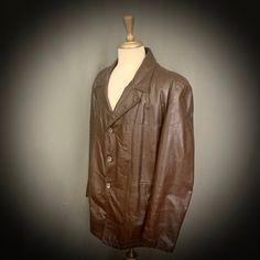 *ITEM DETAILS* - Era- 1970's - Brand- London Fog - Size- 46 Regular (please see the measurements for an accurate fit) - Material- Leather Acetate Lining Cotton/Poly Removable Lining - Made in Baltimore, Md *This item is in excellent vintage condition with no holes or stains.* *Shown here on a size 6-8 mannequin* *Measurements are taken while flat and doubled for the chest/waist* - Shoulders- 20.5 inches (across, seam to seam) - Chest- 46 inches (pit to pit, doubled) - Length- 29 inches from shou Retro Vintage Brown Leather Jacket With Long Sleeves, Retro Long Sleeve Vintage Brown Leather Jacket, Retro Vintage Brown Leather Jacket, Vintage Leather Sport Coat With Long Sleeves, Retro Brown Outerwear For Formal Occasions, Retro Brown Formal Outerwear, Vintage Leather Sport Coat For Fall, Retro Business Outerwear For Fall, Retro Business Outerwear With Lapel Collar