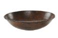 a wooden bowl on a white background