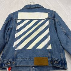 Off-White Diagonal Tab Slim Denim Jacket Blue Men’s Small $920. Never Worn With Tag, But Back Logo Is Dirty. Off-White Diagonal Tab Slim Denim Jacket In 100% Cotton. Made In Italy. Machine Wash. Front Button Closures. Chest Flap Pockets And Front Welt Pockets. Buttoned Cuffs And Adjustable Button Tab Hem At Back. Off-White Print. Faded Wash And Light Distressing. Offf-Mo151. Omye079c99den0044901. Casual White Outerwear With Patch Pockets, White Denim Jacket With Patch Pockets For Spring, White Denim Outerwear For Fall, White Urban Denim Jacket With Pockets, White Urban Denim Jacket For Spring, Spring White Denim Outerwear, White Denim Outerwear With Pockets, White Denim Outerwear For Streetwear, Urban White Denim Jacket For Fall