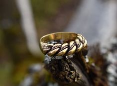 "Handmade sterling silver 925 or bronze ring. This braided ring, in Latvian, called \"Nameja gredzens\" (in translation \"Ring of Namejs\") is one of the most popular or even the most popular Latvian ring. The same design rings are also found in the territory of nowadays Lithuania. Braided rings were also popular in medieval times in Scandinavian countries, although in different designs.  Dear customer, if you would like to order the bronze ring, please keep in mind that bronze sometimes reacts Antique Handmade Ring For Ceremonial Occasions, Traditional Bronze Rings For Ceremonial Occasions, Bohemian Gold Rings For Ceremonial Occasions, Antique Hand Forged Rings For Ceremonial Occasions, Handmade Bronze Rings For Ceremonial Occasions, Handmade Adjustable Engraved Ring For Ceremonial Occasions, Handmade Adjustable Engraved Ring For Ceremonial Use, Heirloom Adjustable Ceremonial Ring, Medieval Style Ceremonial Round Ring