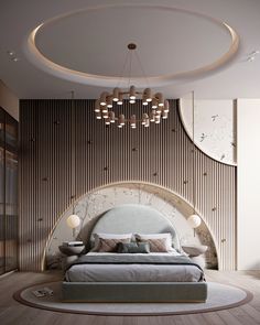 a large bed sitting in the middle of a bedroom next to a round light fixture