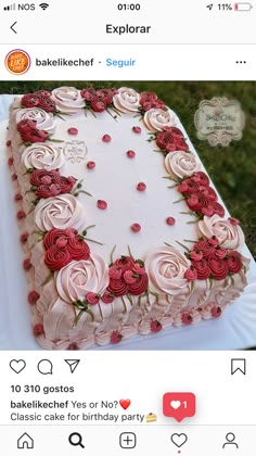 the cake is decorated with pink and red flowers