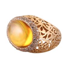 Pomellato 18k rose gold Arabesque ring with 1.40ctw Fancy VS diamonds and 23mm x 16mm citrine. DESIGNER: Pomellato MATERIAL: 18k Gold GEMSTONES: Diamond, Citrine DIMENSIONS: Ring size 6.25, top is 22mm x 30mm. MARKED/TESTED: Pomellato, 750, Italian mark. WEIGHT: 23.1 grams CONDITION: Previously Owned/Excellent Condition Elegant Amber Rings With Gemstone Accents, Elegant Amber Topaz Ring, Elegant Orange Topaz Ring, Elegant Orange Rings With Gemstone Accents, Elegant Yellow Cabochon Rings, Dome Ring, Vs Diamond, Domed Ring, Arabesque