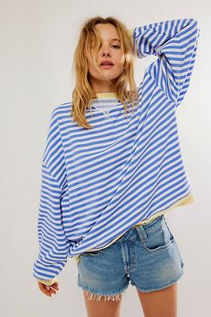 So cool and classic, this timeless crewneck is featured in an oversized, slouchy silhouette and staple striped print with contrasting hems for added dimension. **Fit:** Relaxed, oversized fit **Features:** Crew neckline, dropped shoulders, contrast hems **Why We | Classic Striped Oversized Crewneck by We The Free at Free People in Blue, Size: XL Style Bleu, Beachy Outfits, Oversized Striped Sweater, Oversize Pullover, Pull Oversize, Oversized Crewneck, School Clothes, Estilo Chic, School Fits