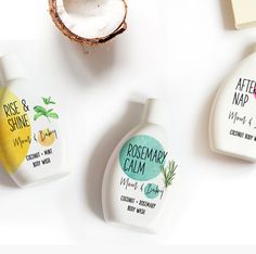 three different types of hand soaps on a white surface next to an open coconut