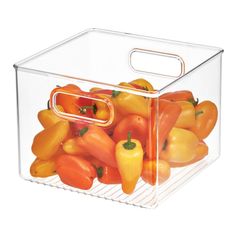 a clear container filled with lots of different colored peppers