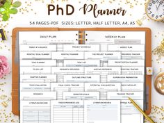 the printable planner is on top of a clipboard with gold confetti